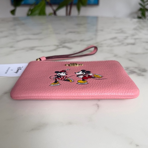 NWT Disney X Coach Corner Zip Wristlet With Ice Skate Motif CN026 Light Blush
